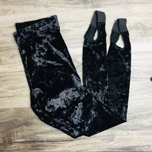 Black velvet stirrup pants